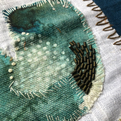 Turquoise Tulip Embroidery with Charcoal Stitches