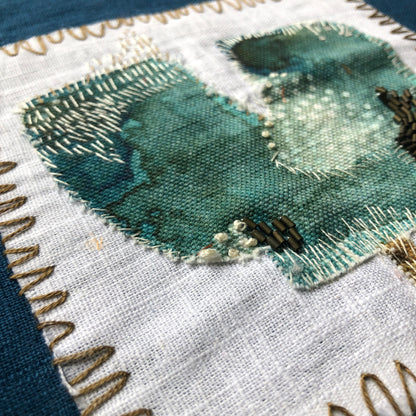 Turquoise Tulip Embroidery with Charcoal Stitches