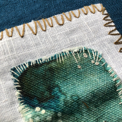 Turquoise Tulip Embroidery with Charcoal Stitches